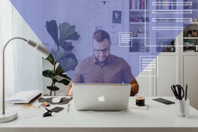 a person sitting at their desk sending out emails