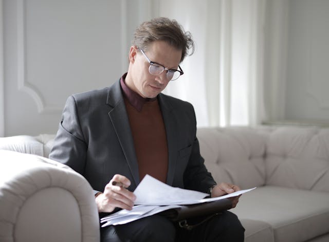 a property manager reviewing a lease contract